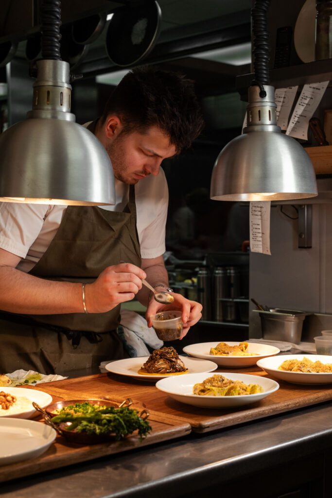 Chef plating a dish